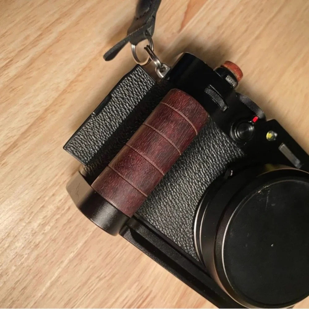 Fujifilm Black Camera with Olive Strap